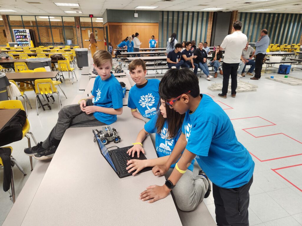 Students coding their robot